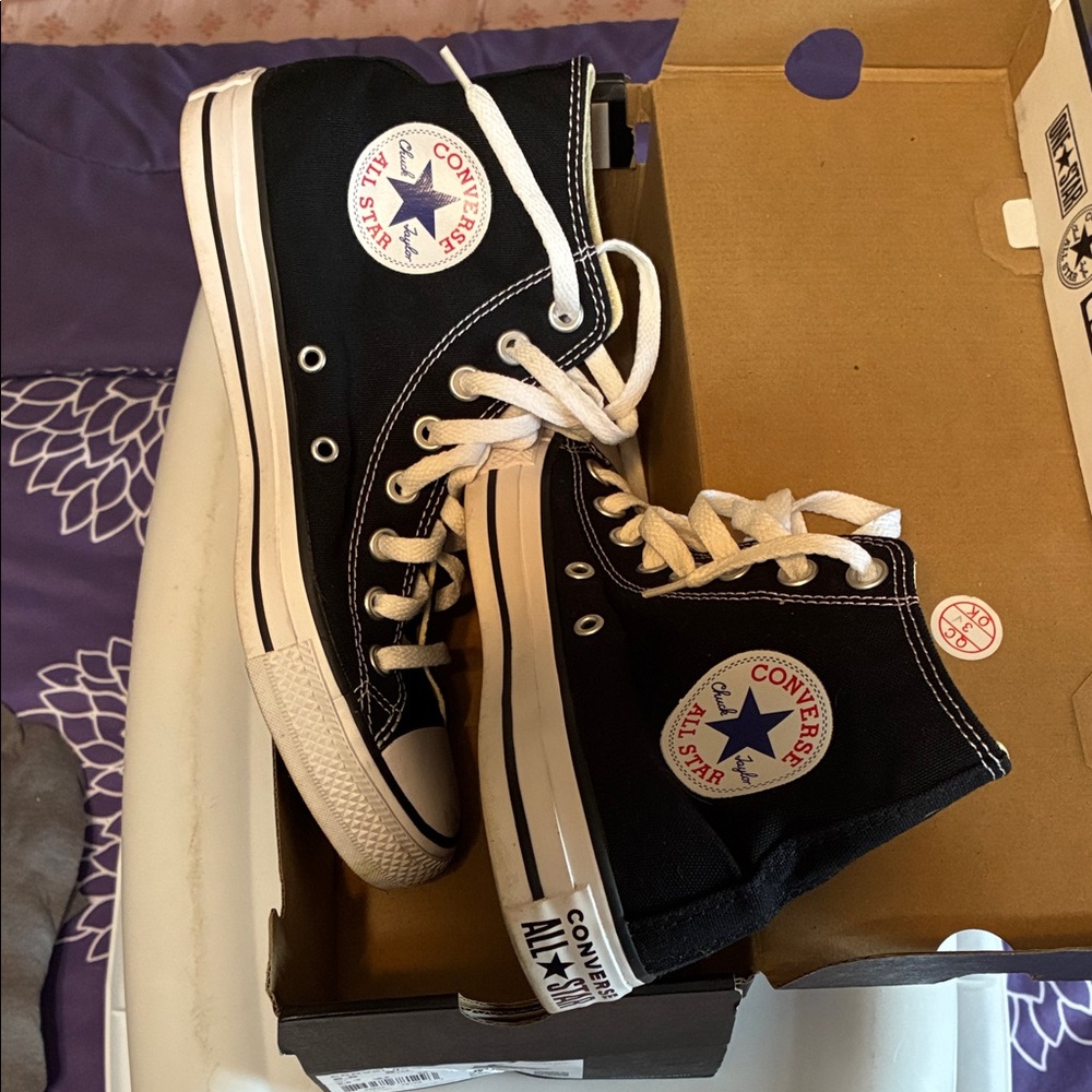 Converse Black and White High-Top Chuck Taylor All Star Sneakers